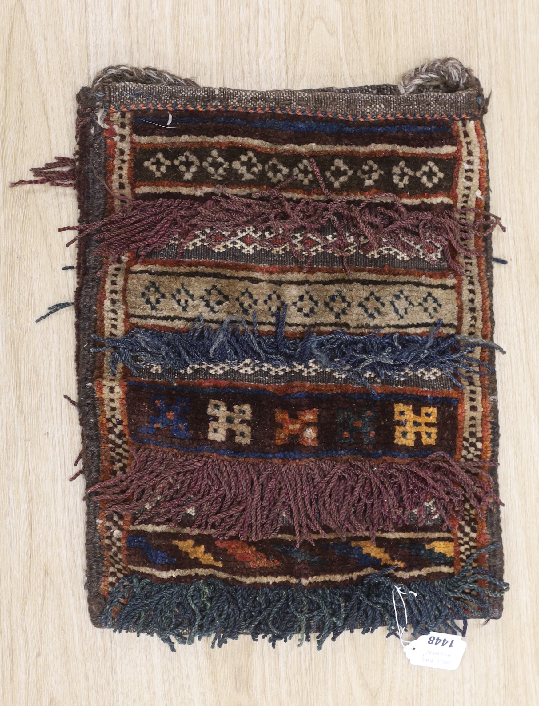 A Caucasian ‘salt’ carpet bag with tasseling, 38cm x 48cm